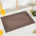 Brown woven PVC placemat, heat-resistant table mat, waterproof and oil-proof dining pad. - Brown