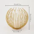 Modern minimalist gold metal wire spherical candle holder with pillar candle for home decor - Lantern Candle Holder / Gold