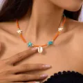Bohemian orange beaded necklace featuring stylish starfish and cowrie shell pendants - Orange Seed Bead Green Starfish Tiger Shell (NC25Y0045-1)