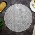 Round hollow PVC placemat, white table mat with tropical palm and wave design, main view. - Coconut Tree / 38 cm / Silver