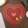 Red heart-shaped hollow placemat waterproof PVC heat-resistant table mat for dining room decor. - 38 cm / Red