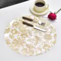Nordic luxury waterproof PVC placemat with golden embossed floral pattern detail and heat insulation. - Tulip Waterproof Place Mat / Gold