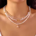 Bohemian layered white seed bead necklace with starfish and shell pendants - Three Layer White Seed Bead Shell Pink Starfish (NC42NC25Y0175-1)