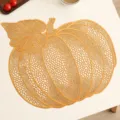 Gold hollow PVC pumpkin placemat for stylish dining table decoration and waterproof use. - Leaf Pumpkin / Orange