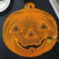 Orange pumpkin PVC hollow placemat, Nordic style table mat, waterproof and heat resistant. - Smiling Pumpkin / Orange