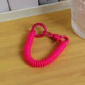 Llavero de resorte rosa vibrante cordón teléfono retráctil colgante bolsa escolar accesorio - Nuevo cordón de resorte colorido, rojo rosa