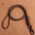Cordino in paracord fatto a mano con moschettone nero, portachiavi resistente per chiavi e telefono. - Caffè