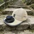 Summer solar charging fan hat breathable mesh sun protection baseball cap close-up view. - Milky White