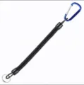 Close-up detail view of a black coiled spring fishing lanyard with a blue carabiner and key ring. - Blue