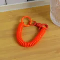 Llavero de espiral de cable telefónico naranja vibrante elástico colgante bolso anti pérdida - Nuevo cordón de resorte colorido, naranja