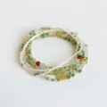 Macro view of multi-layer bohemian beaded waist chain with colorful seed beads - Multi-layer Beaded Style (Y0323-2) / Light Green Orange Red Mix