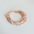Detailed view of bohemian multi-layered pink white and gold seed bead beach waist chain - Multi-layer Beaded Style (Y0323-4) / Pink White Gold Color-Block