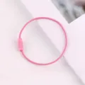 Pink coated steel wire rope keychain ring screw lock DIY bag pendant accessory detail view. - Pink