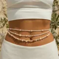 Detailed close-up view of bohemian beach waist chain with starfish, shells and pearls. - European Marine Multilayer Shell Starfish Style (XK26Y0306)