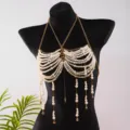 Detailed view of elegant pearl chest chain with golden seahorse and starfish charms. - Gold Seahorse Chest Chain