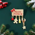 Close-up of Christmas enamel brooch with gingerbread man and reindeer pendants - 鹿头星星款