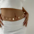 Detailed view of bohemian gold waist chain with shell, starfish, and pearl charms. - Gold Hollow Starfish Scallop Pearl Style (BJ25Y0039-2)