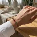Elegant copper tulip bracelet with red and green zircons for a luxury floral look. - Gold Red Green Zirconia