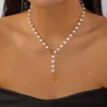 Close-up detail of elegant rosary-style pearl necklace with a gold cross pendant - Retro Artificial Pearl Gold Rosary Cross Necklace (NC25Y1193)