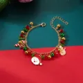 Detailed view of a festive Christmas charm bracelet featuring Santa Claus and candy cane charms - #2 Bracelet