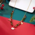 Close-up of festive Christmas necklace with Santa, snowman charms and crystal beads - #2 Necklace