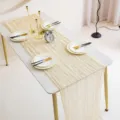 Detailed view of the elegant pleated cheese cloth table runner in a cozy dining room setting. - 90*300cm / Beige