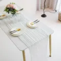 Detailed view of white gauze cheesecloth table runner, perfect for wedding party decor. - 90*300cm / White