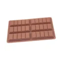 Vista detallada del molde de chocolate de silicona con cavidades rectangulares para hornear. - Tira larga 6x5