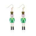 Festive Christmas nutcracker acrylic drop earrings in green soldier design for holiday - Green Nutcracker