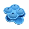Detailed close-up view of the blue 4-cavity silicone round ice cube tray mold. - Sky Blue