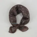 Close-up detail of the brown paisley printed square scarf, elegant fabric texture. - Exquisite Paisley with Blue Border