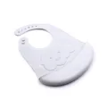 Silicone baby bib detail showing soft grey texture, adjustable buttons and waterproof crumb pocket. - Cloud Style / Off-White