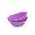 Purple silicone muffin cup detail, flexible baking mold close-up view showing scalloped edge. - Purple