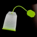Silicone tea infuser in tea bag shape, flexible loose leaf tea strainer for cup mug. - Green