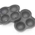 Dark grey silicone 4-cavity round ice ball mold, flexible spherical ice maker tray for drinks. - 4-Cavity Round Ice Ball Maker / Black