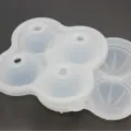 Silicone 4-hole ice ball mold, flexible 4-cavity round ice maker tray for whiskey cocktails. - 4-Cavity Round Ice Ball Maker / Natural