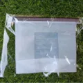 Translucent silicone food storage bag with measurement marks, leakproof kitchen organizer. - Clear