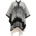 Detailed view of the classic houndstooth pattern and white tassel fringe on this knit poncho - 110*150cm / Black
