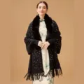 Detailed view of the black knit shawl with sequin accents and a plush faux fur collar - Tops / 70*180cm / Black