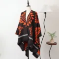 Stylish knitted geometric pattern shawl poncho for cozy autumn and winter fashion look - Trendy Geometric Slit Scarves - Orange