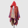 Detailed macro view of a warm red hooded poncho shawl featuring vintage paisley patterns - Red / 135*150CM