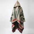 Close-up detail of a hooded poncho with ethnic geometric patterns in soft knit fabric - Khaki Starburst Floral Poncho