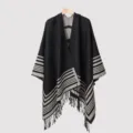 Men's knitted poncho featuring a classic striped pattern and elegant fringe details - 135*150CM / Black