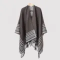 Close-up of the front design and tassels of a men's striped knitted poncho shawl. - 135*150CM / Gray