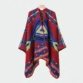 Detailed view of the ethnic geometric pattern on this red and blue knitted warm poncho. - Slit Scarf Tribal Code Red