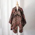 Detailed view of the warm knitted shawl poncho with ethnic geometric pattern for men - Camel
