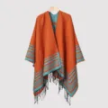 Close-up of men's knit poncho with orange stripes and fringe details - 135*150CM / Orange