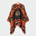Geometric pattern knitted poncho shawl with decorative orange stitched edges - Slit Scarf Tribal Code Orange