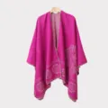 Detail of magenta knitted shawl poncho with ethnic floral pattern and stitched edges - Pink Feather Pattern Split Scarf