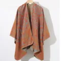 Vintage bohemian floral knit shawl poncho with intricate teal and orange patterns - Orange